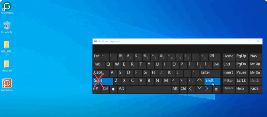 Press and hold the Right Shift key